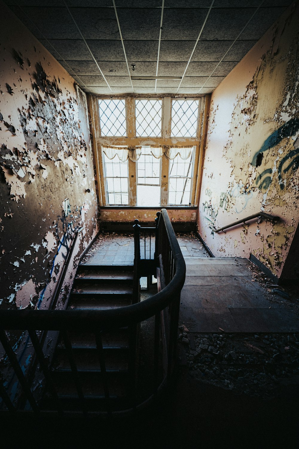 a wooden bench sitting in the middle of a room