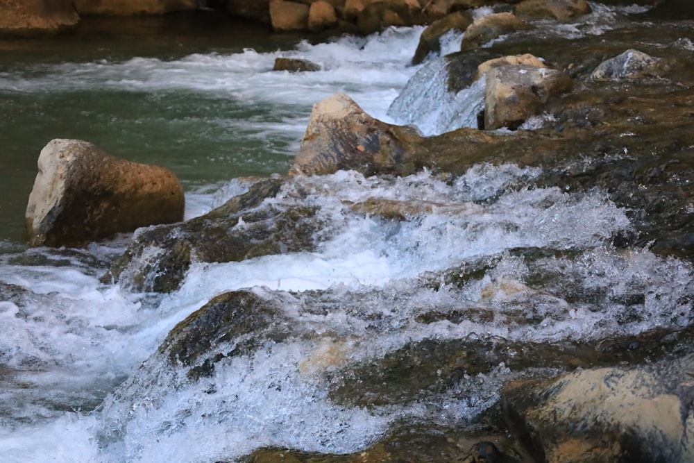 a river with rocks and water