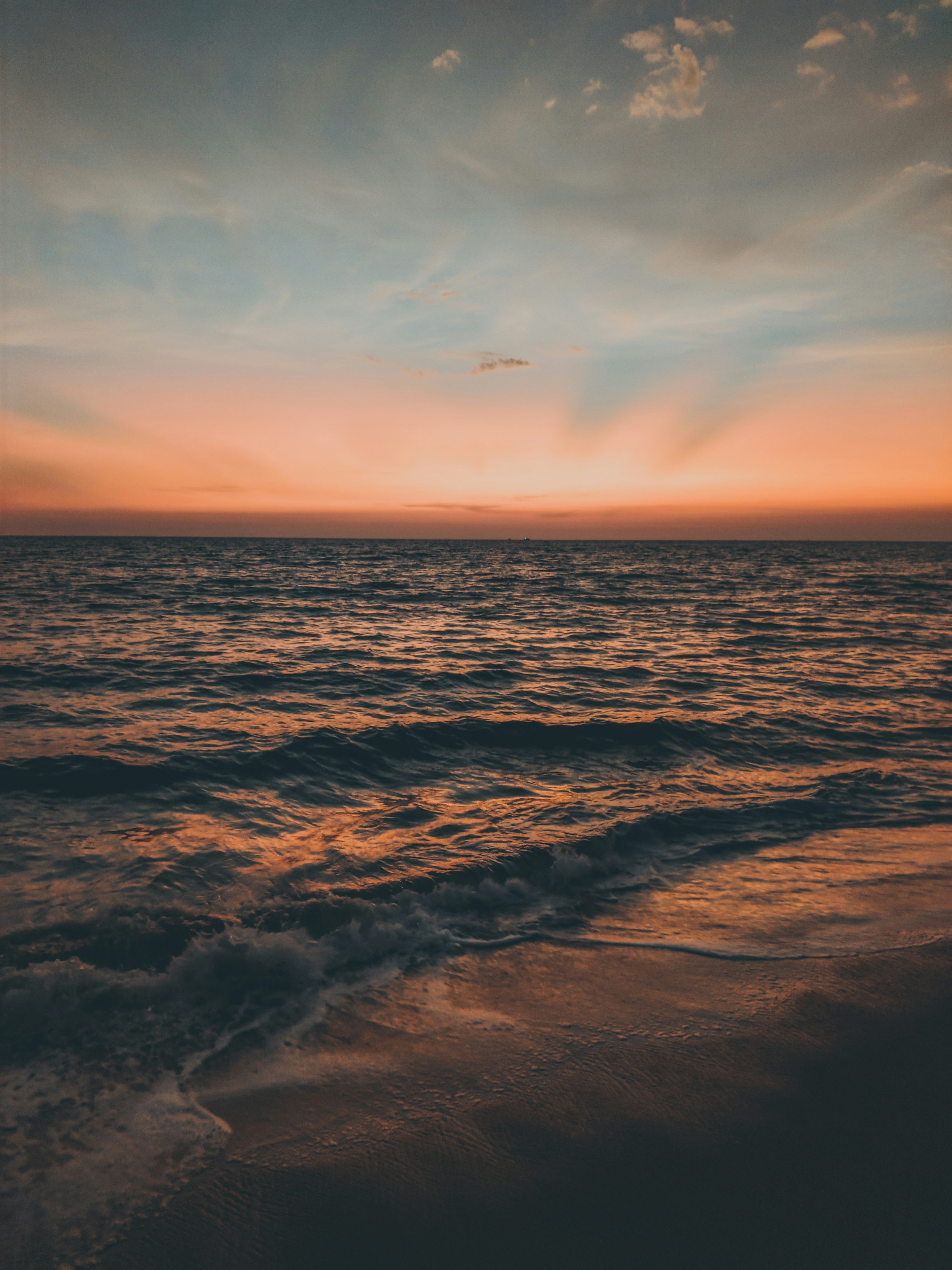 a sunset over the ocean