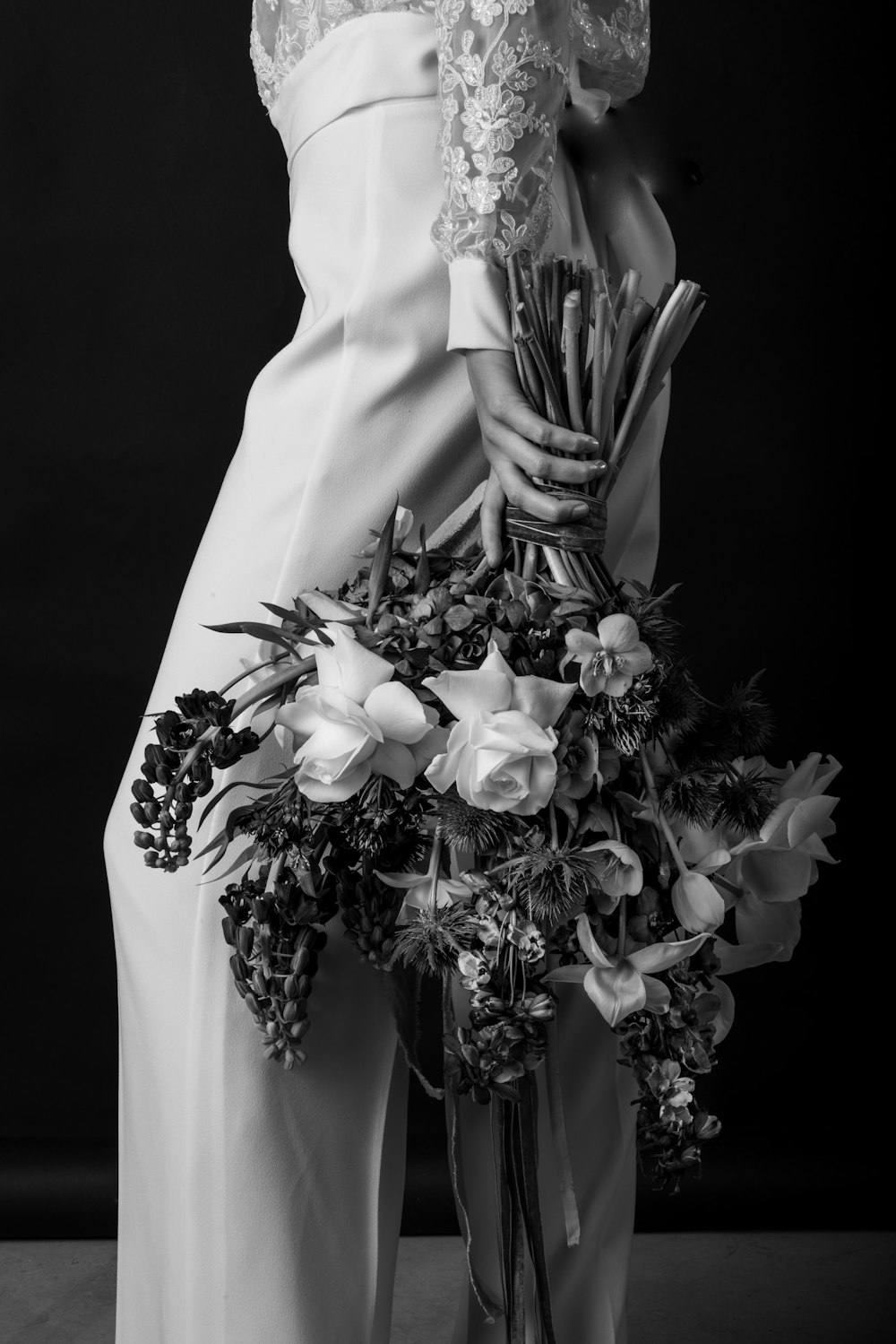 a person holding a bouquet of flowers