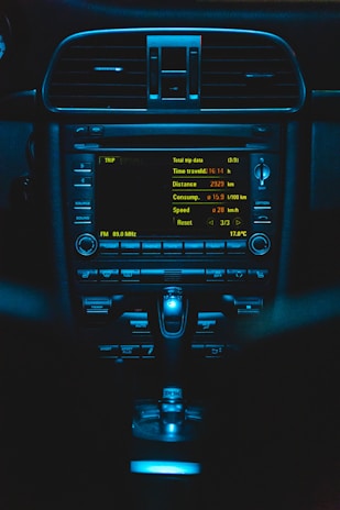 Screenshot of FleetController dashboard showing live vehicle locations and trip details.