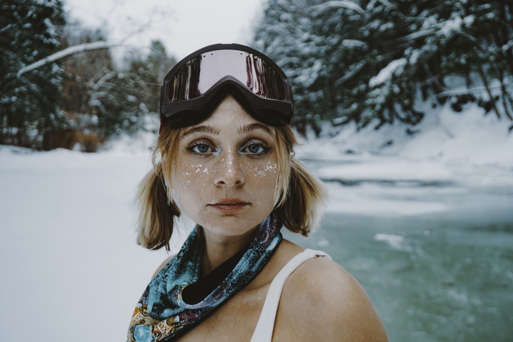 a person wearing a hat and scarf