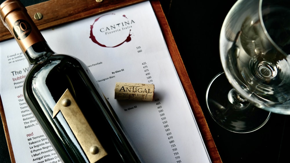 a pen and a glass on a table