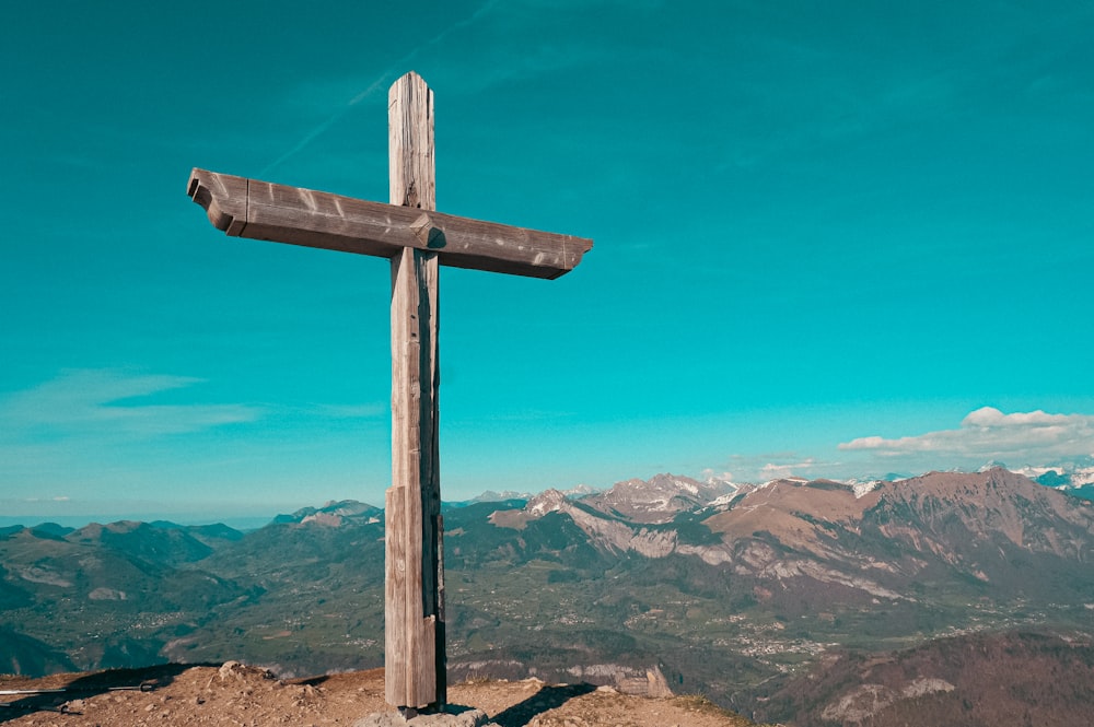 a cross on a mountain