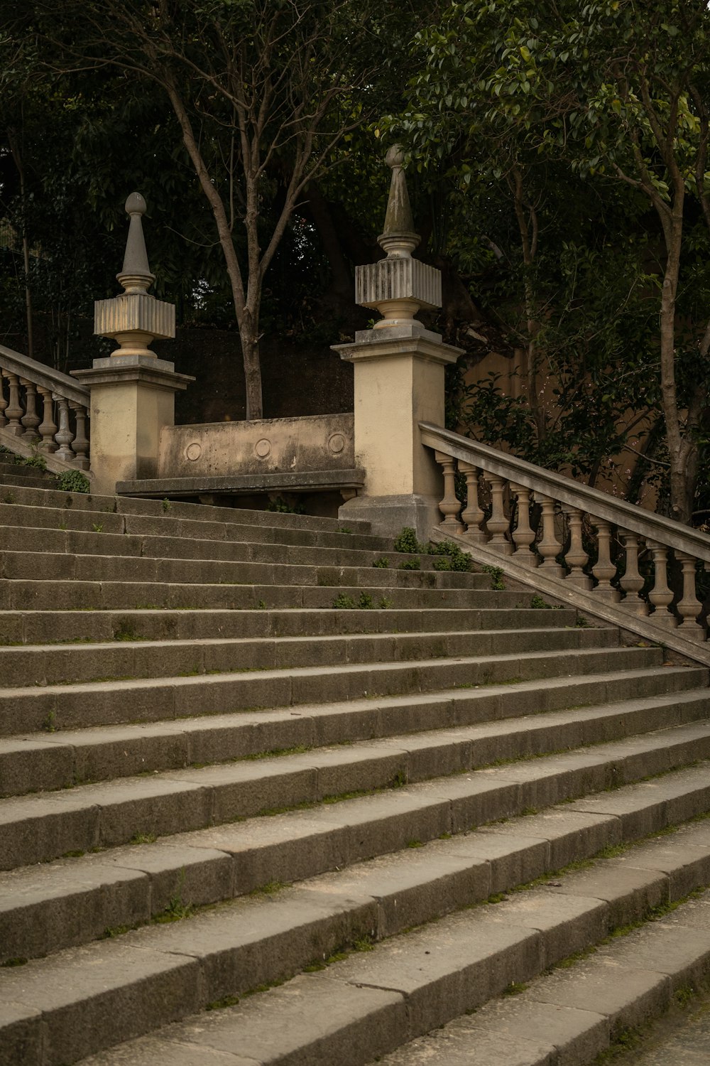 a set of stairs leading up to a statue