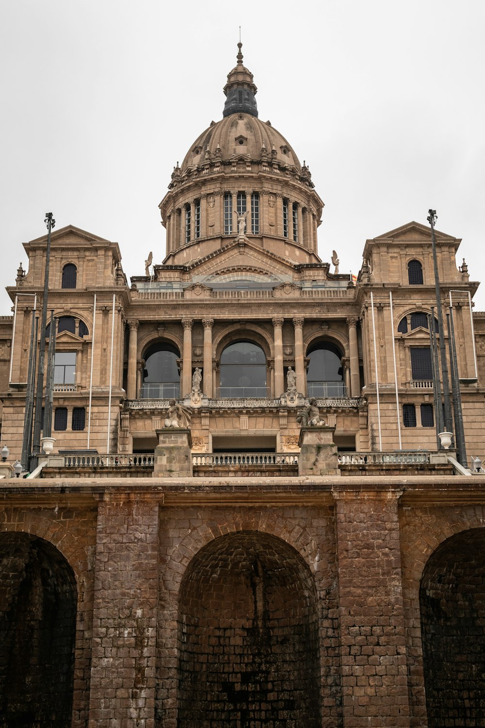 a large brick building with a domed roof