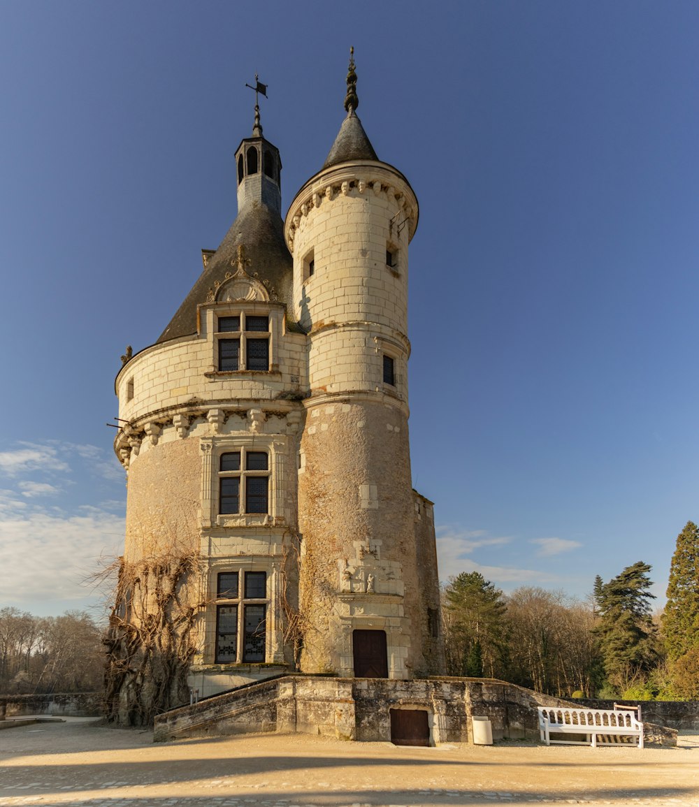 a large stone building with a tower