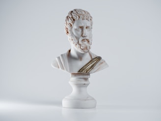 a white statue of a person