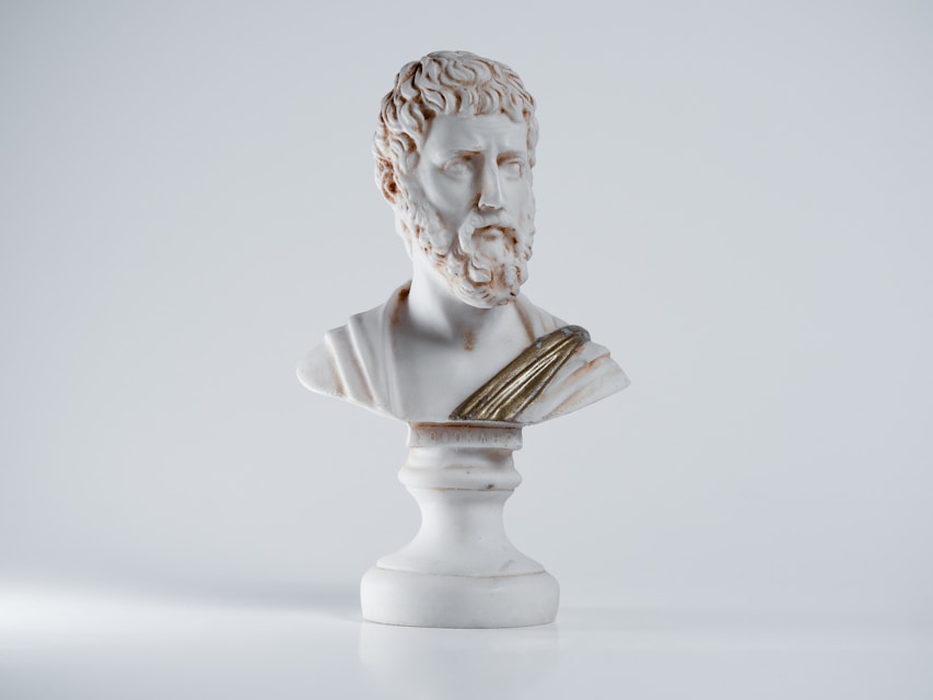a white statue of a person