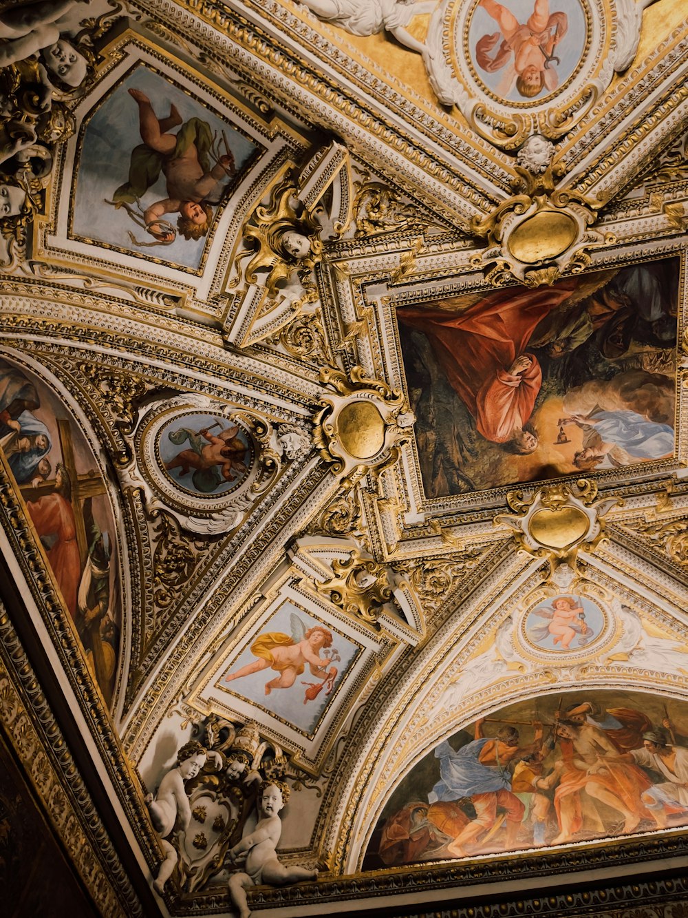 a ceiling with paintings on it