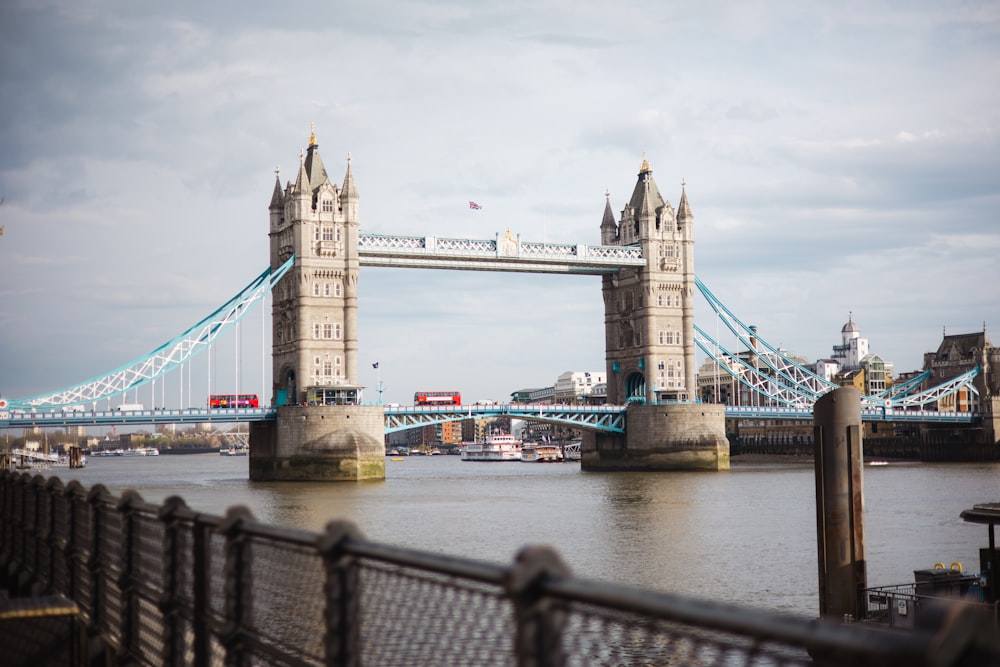 a bridge with towers over water