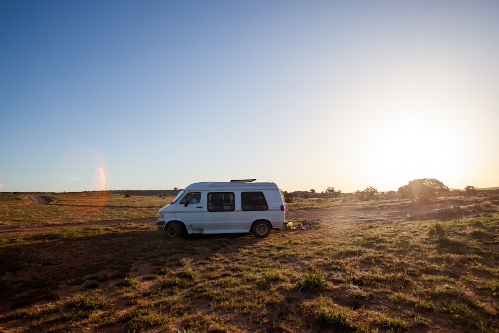 a white van parked in a field