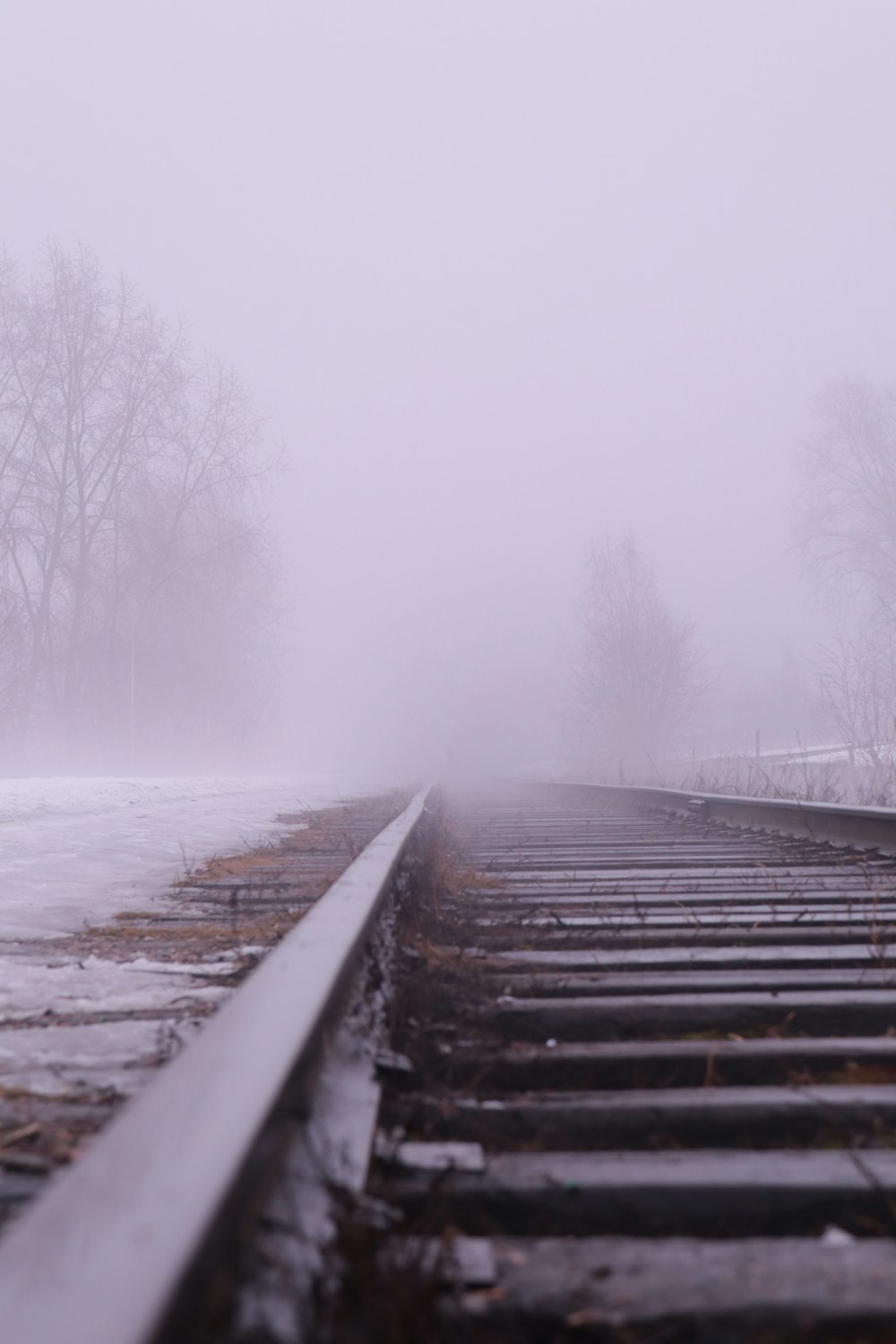 a wooden staircase leading up to a snowy field