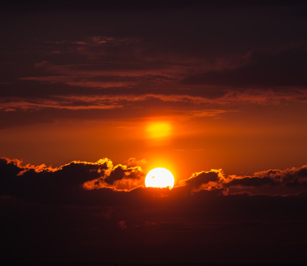 a sunset with clouds