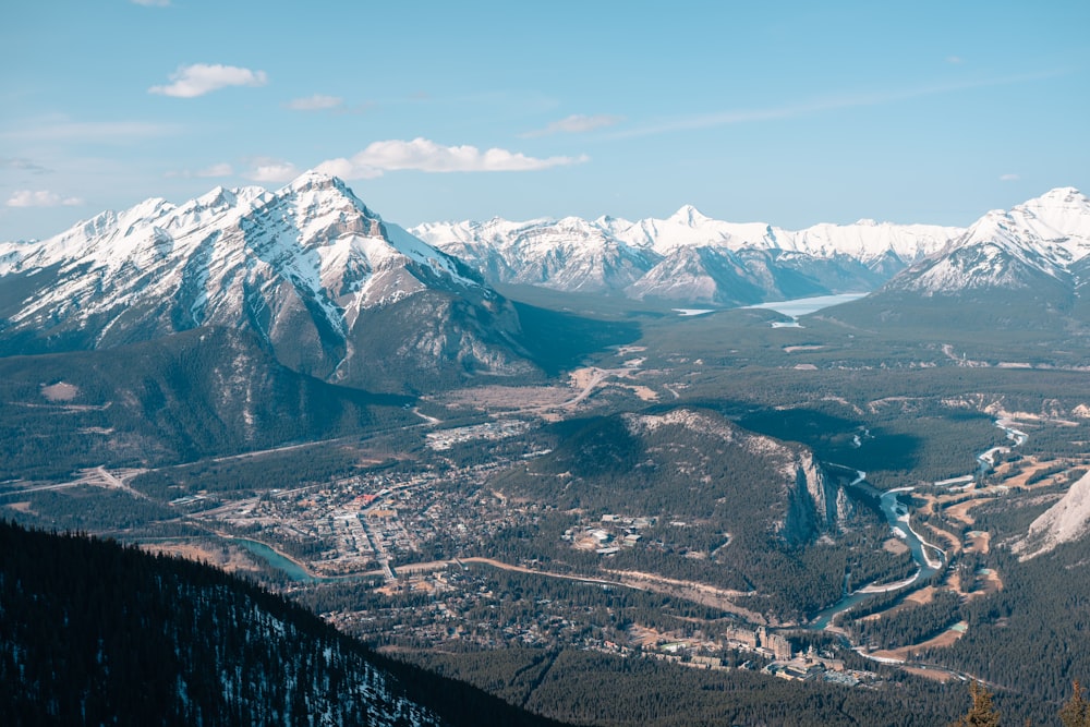 a city in front of a mountain range