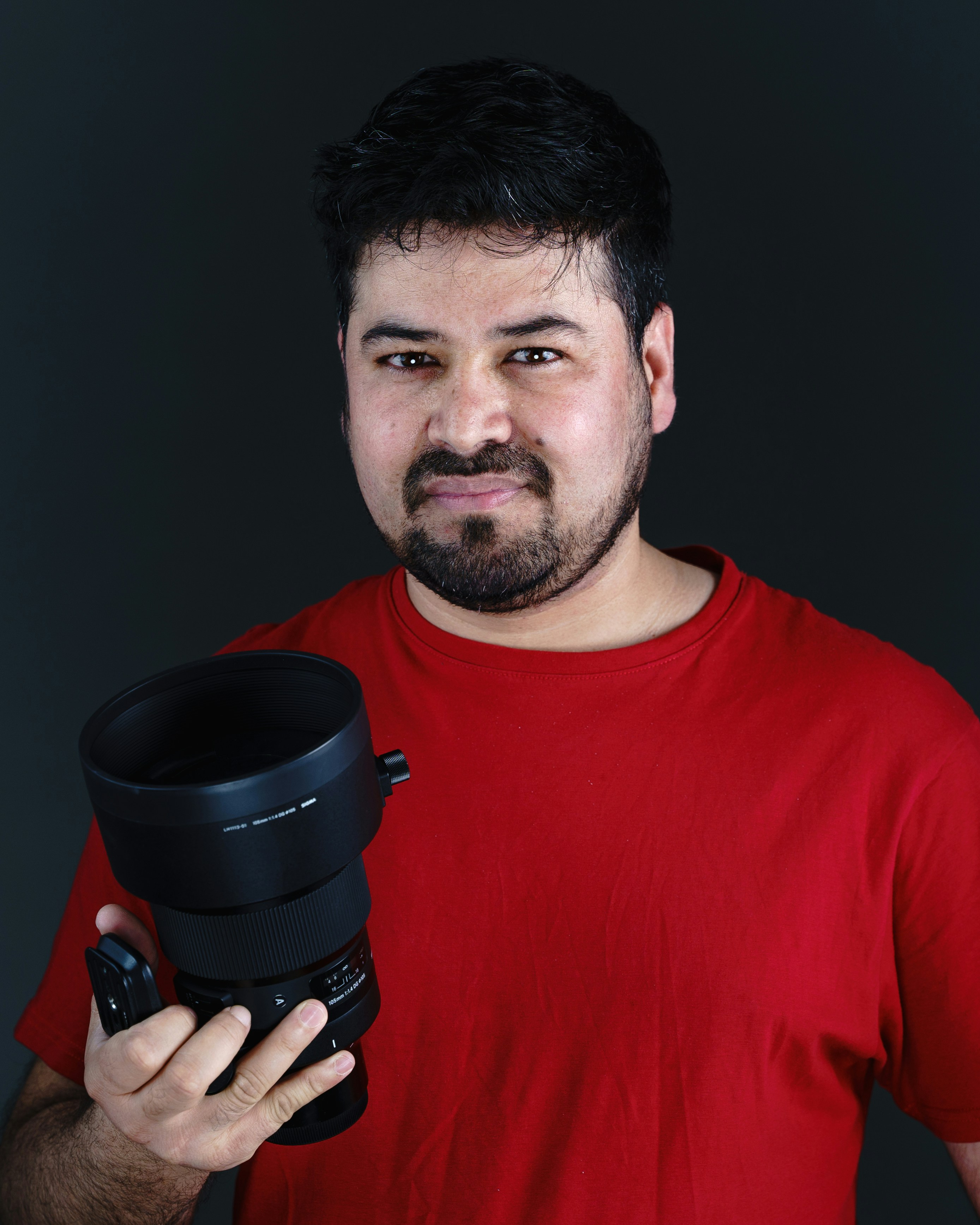 a man holding a cup