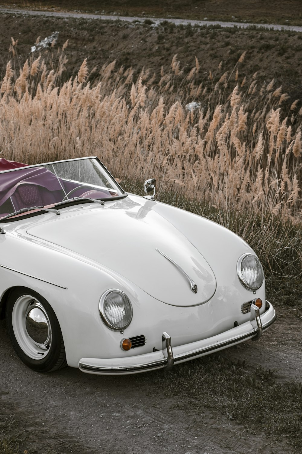 a white car parked on a road