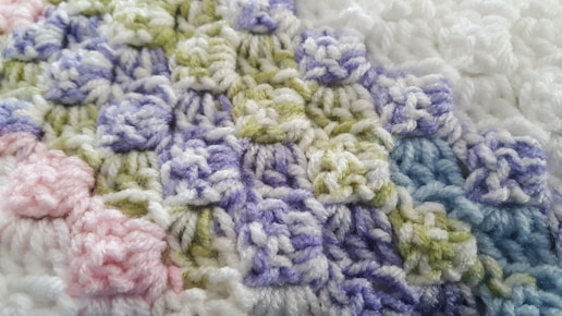 a close up of a pile of colorful coral