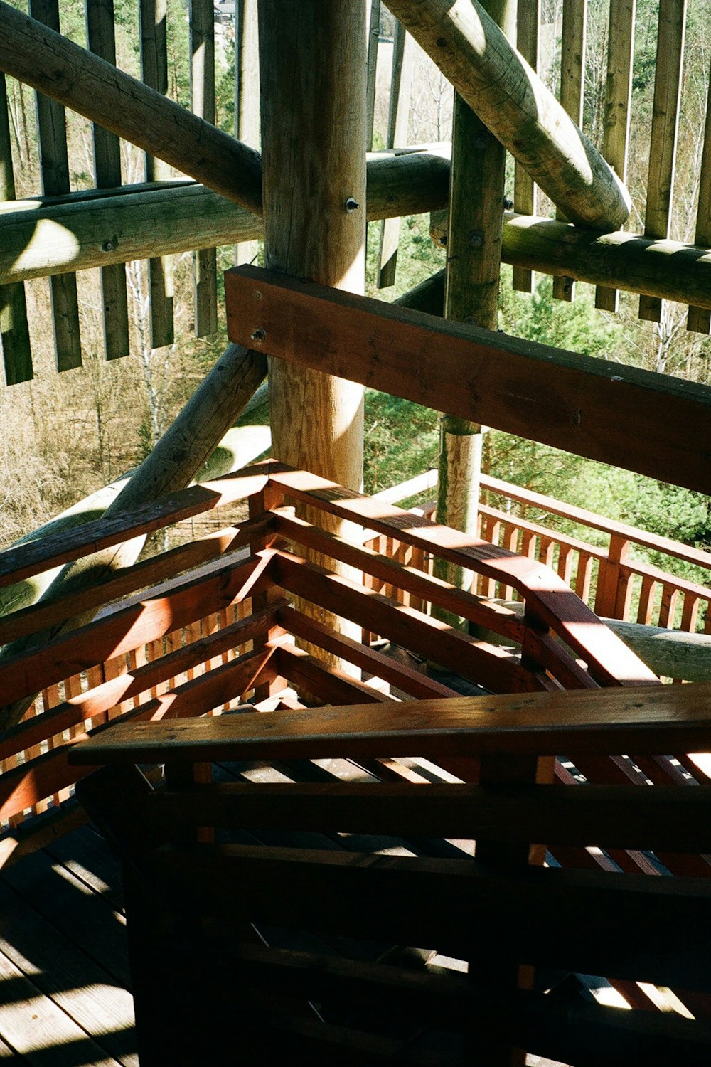 a wooden structure with a railing