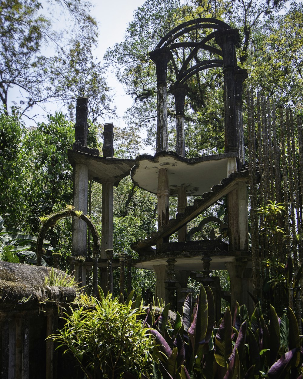 a birdhouse in a garden