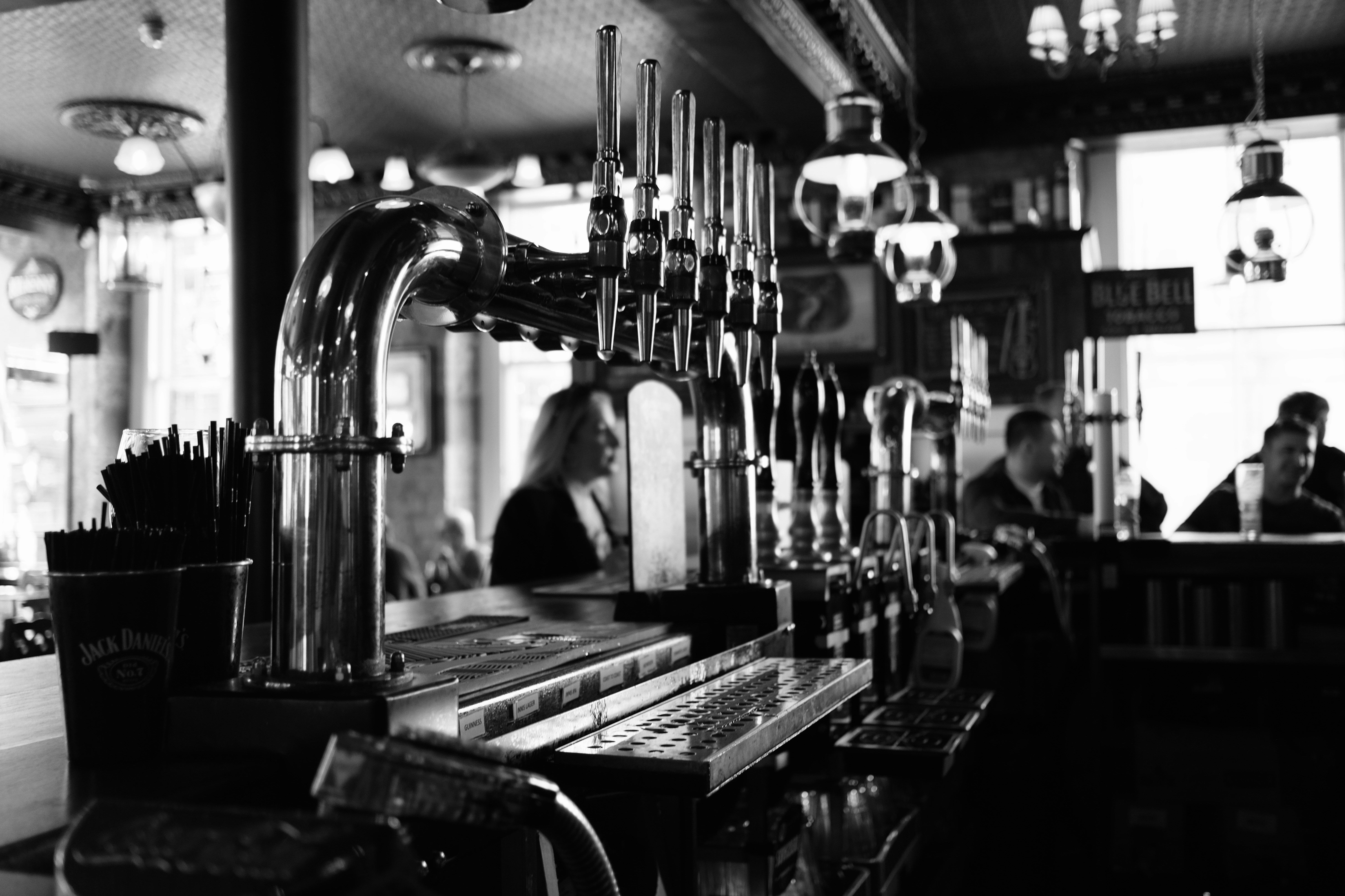 a bar with a large metal machine, 