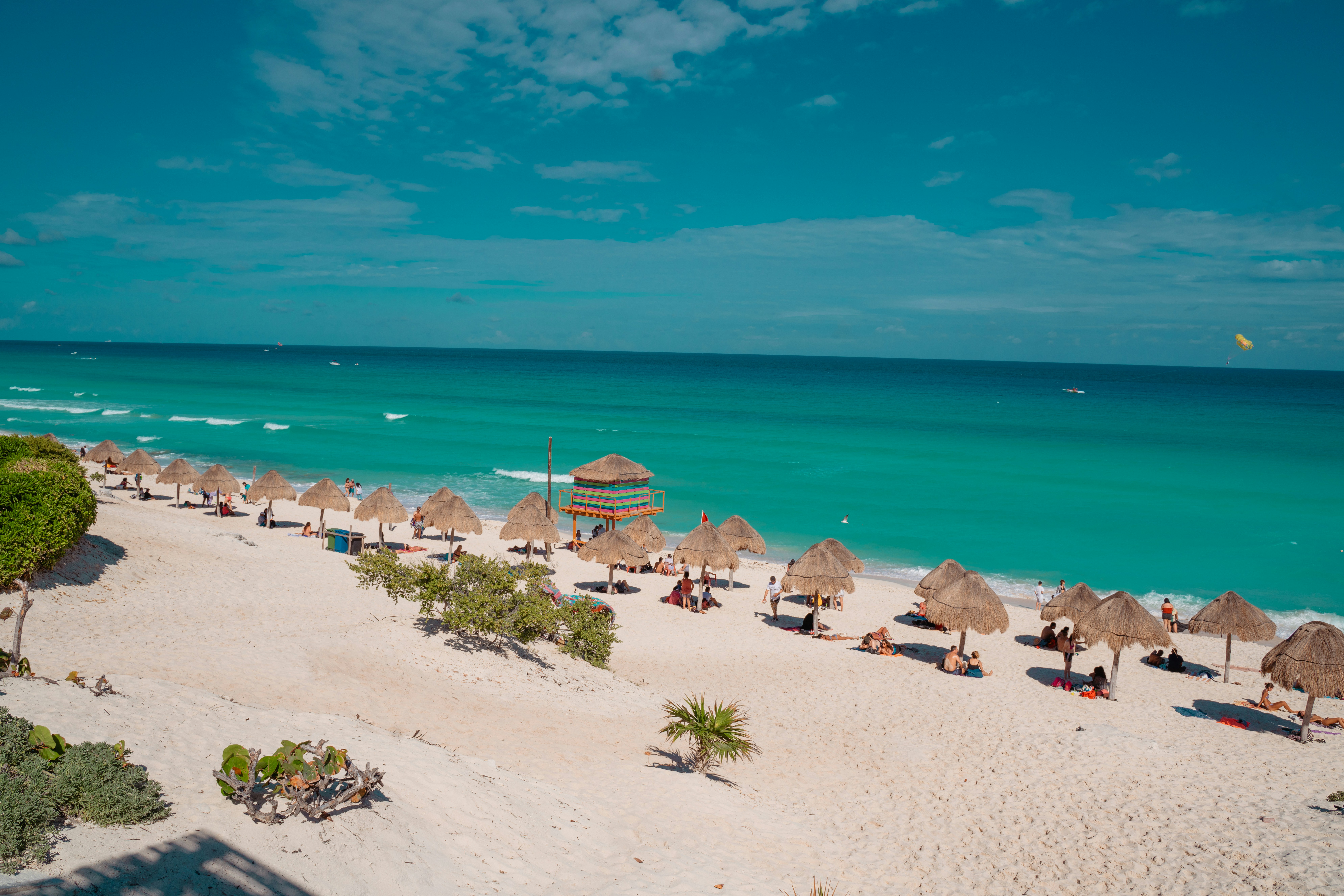 Cancun beach with umbrellas and chairs