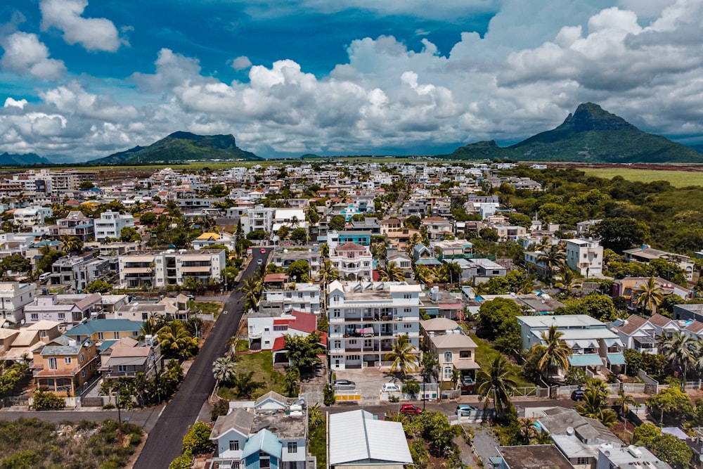 a city with mountains in the background