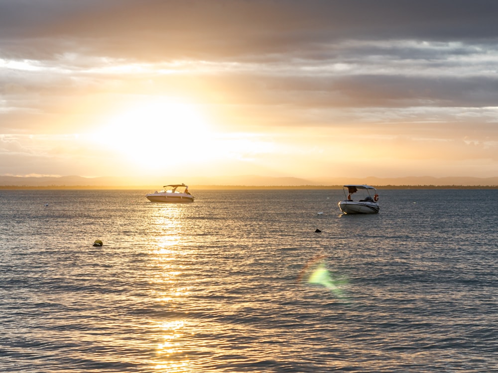 a group of boats on the water