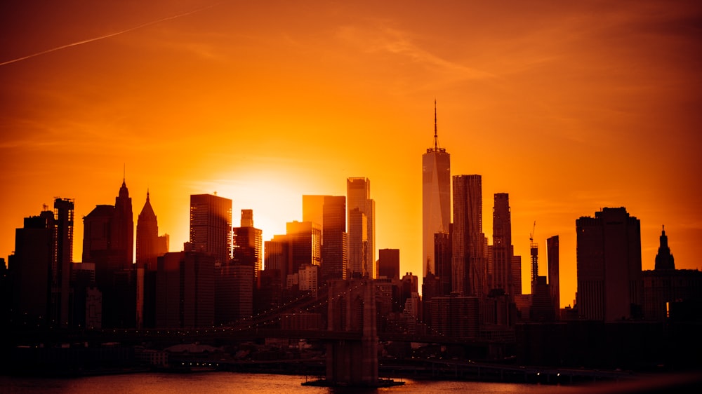 a city skyline at sunset