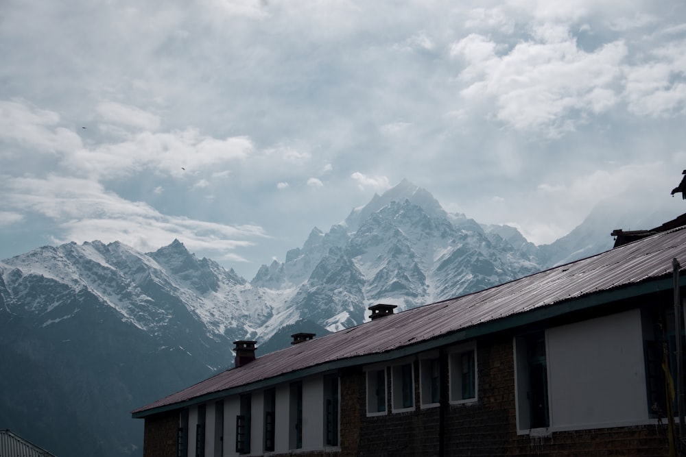 a house with mountains in the background