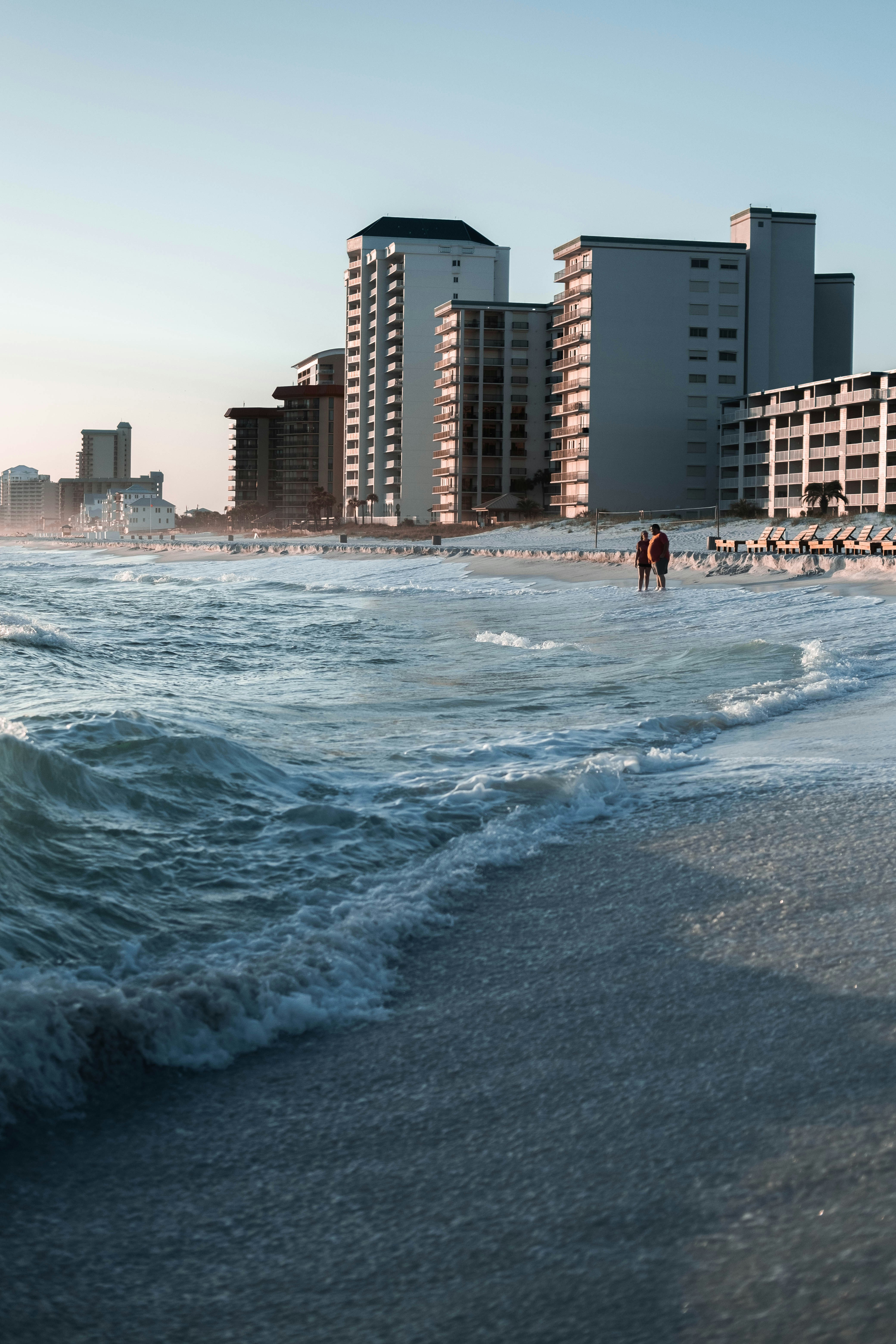 A body of water with buildings along it photo – Free Panama city beach