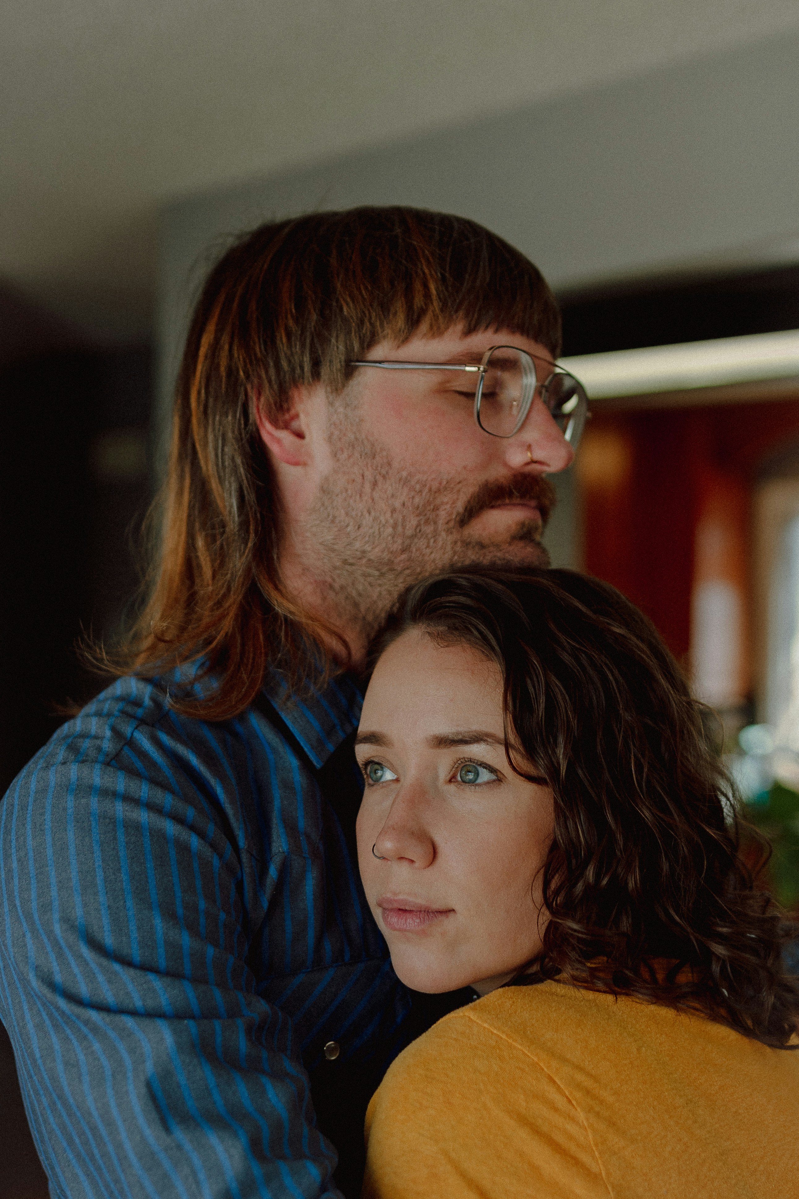 a man and woman posing for a selfie