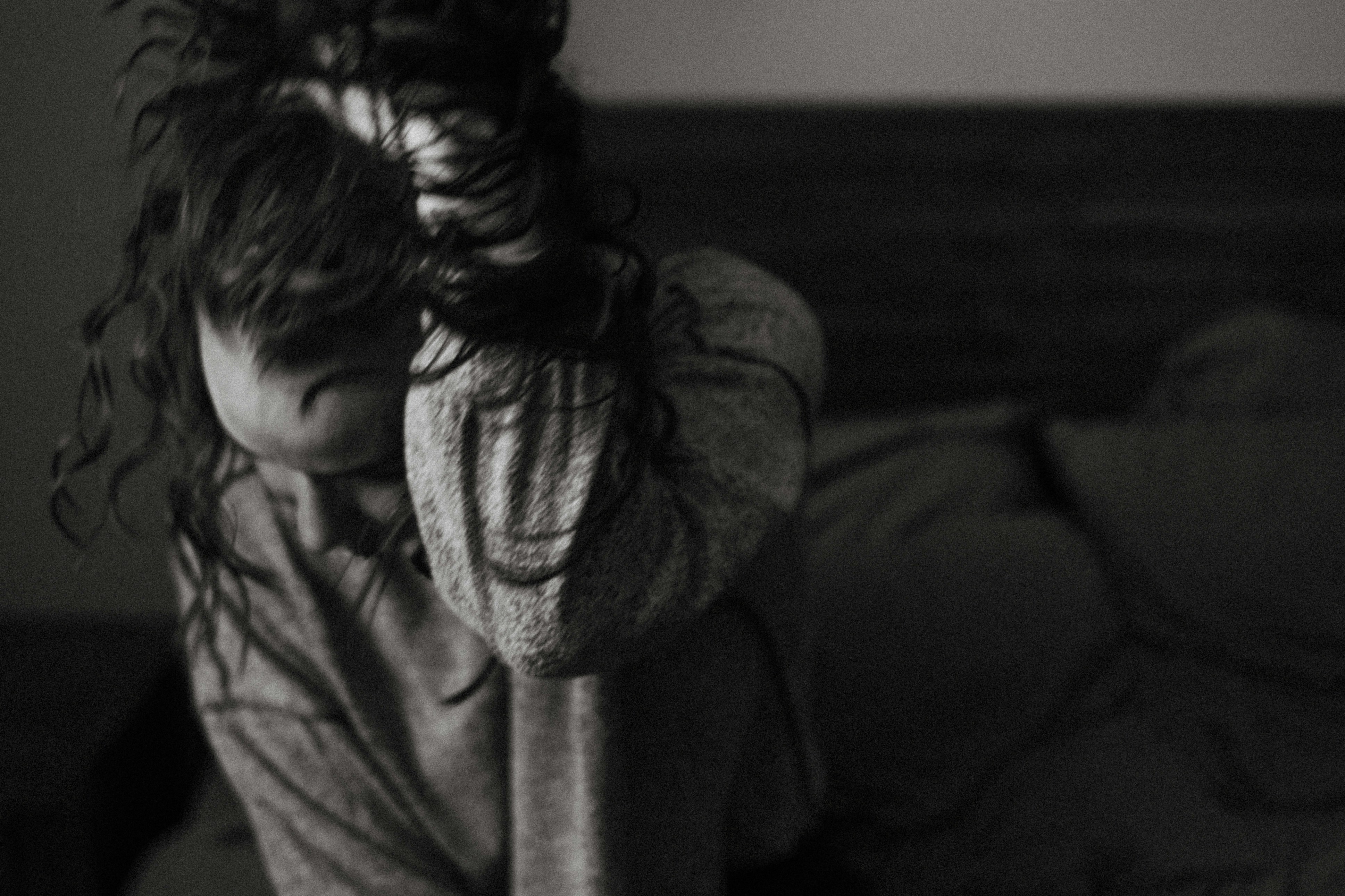 a person lying on a bed