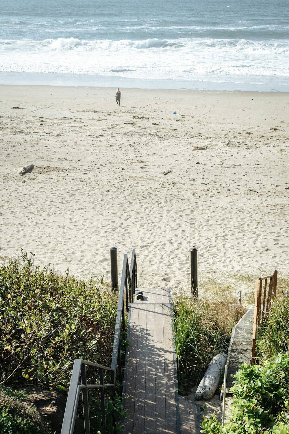 a person walking on a beach