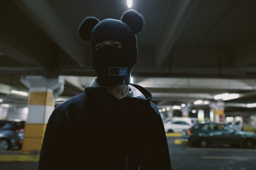 A mysterious shadowy figure of a polar bear wearing a fedora, hinting at a secretive Arctic mafia theme.