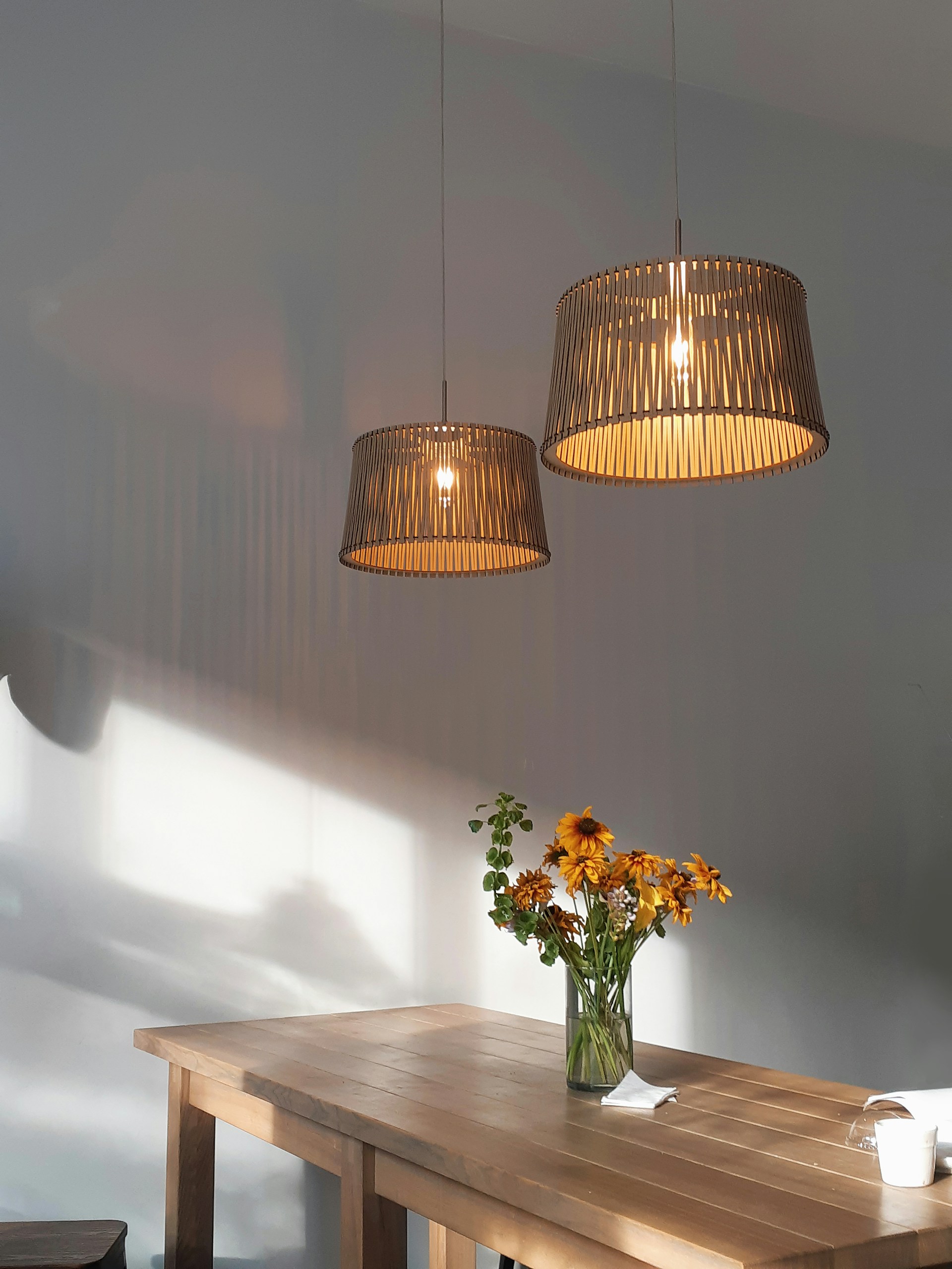 a couple of lamps on a table