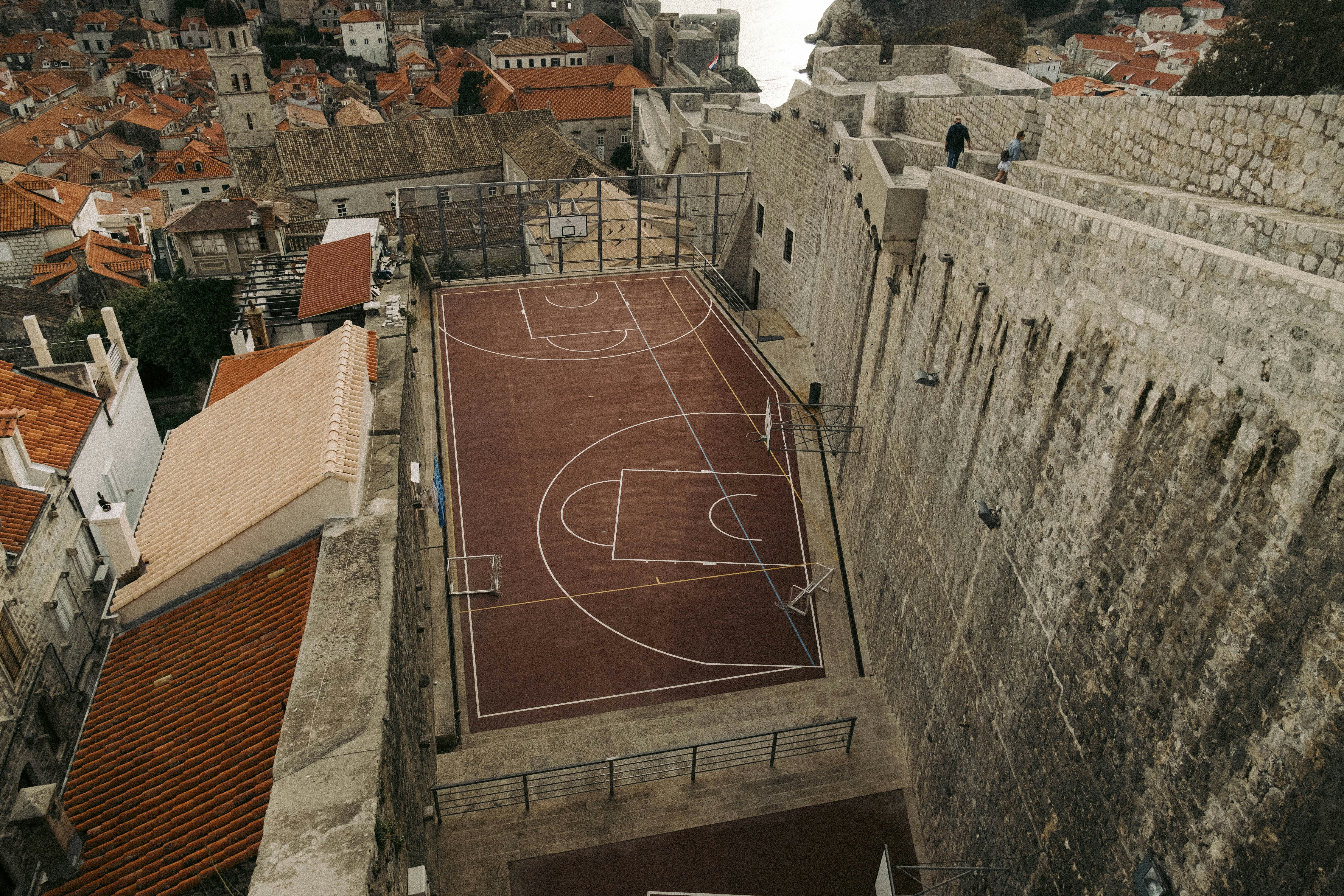 A brick wall with a brick walkway