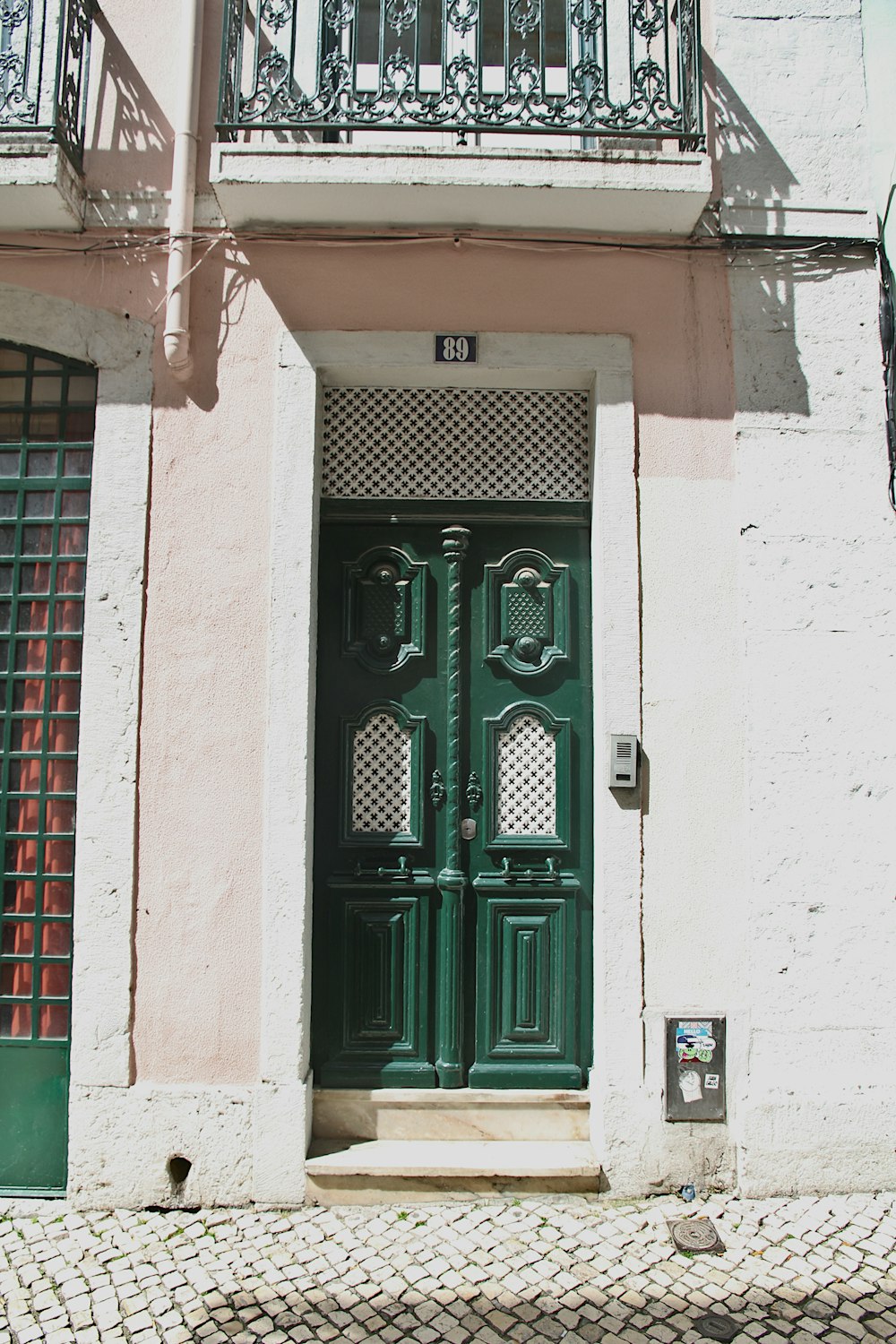 a green door on a building
