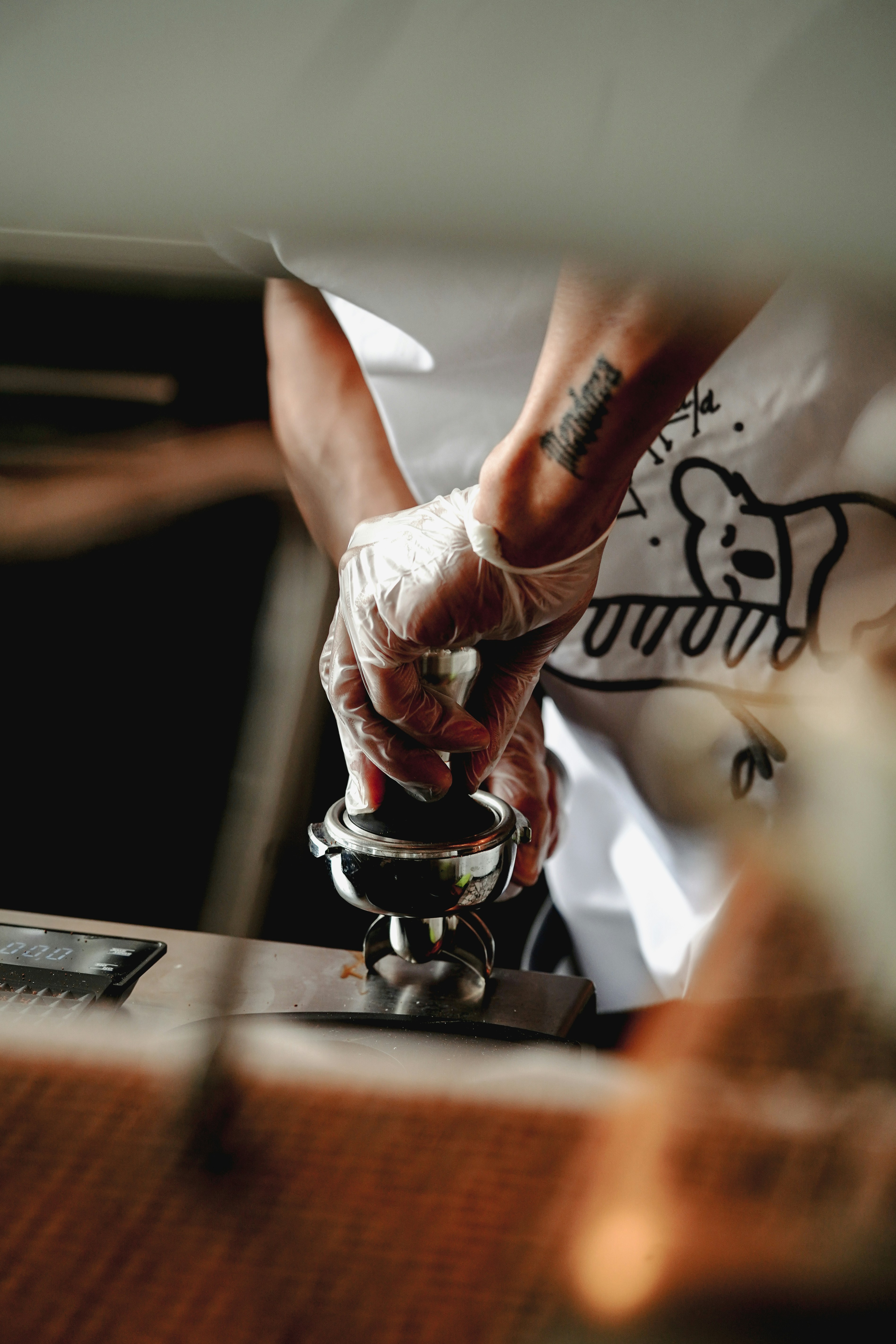 a hand with a tattoo on it