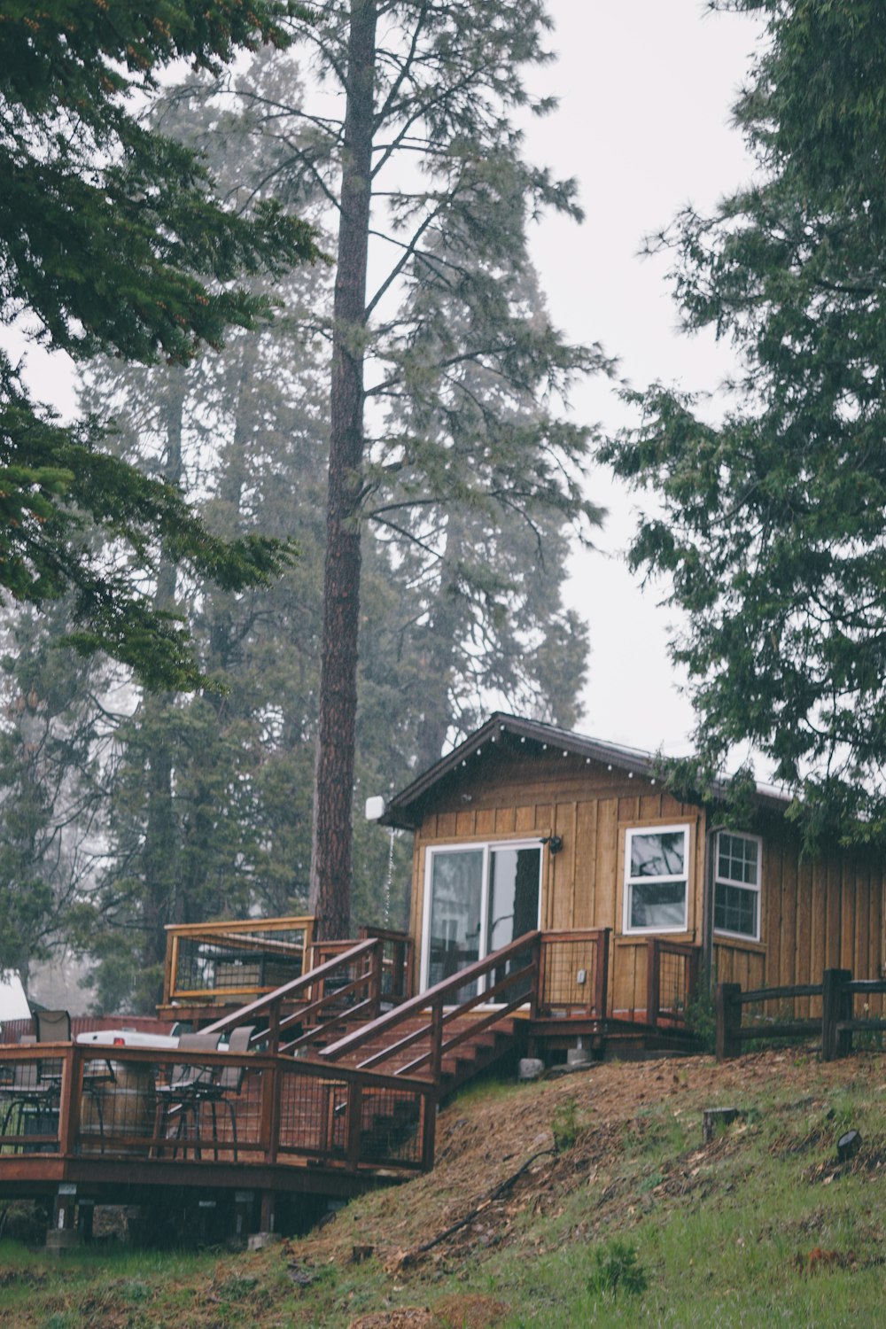 a wooden cabin with a deck