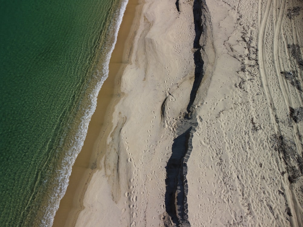 a beach with a body of water