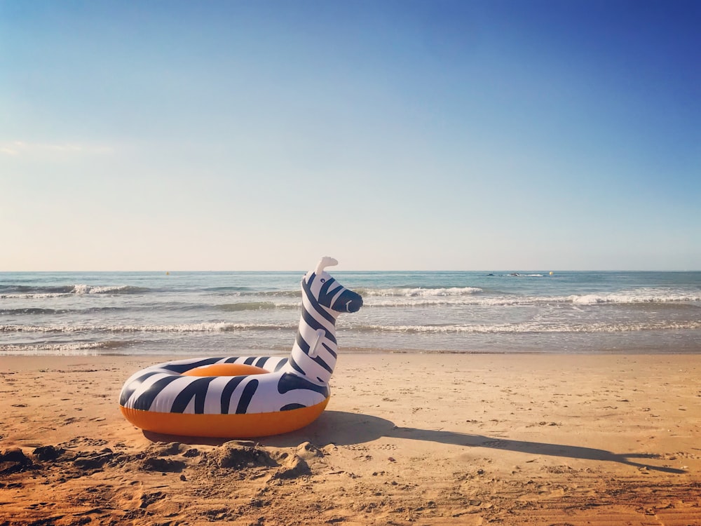 a small boat on a beach