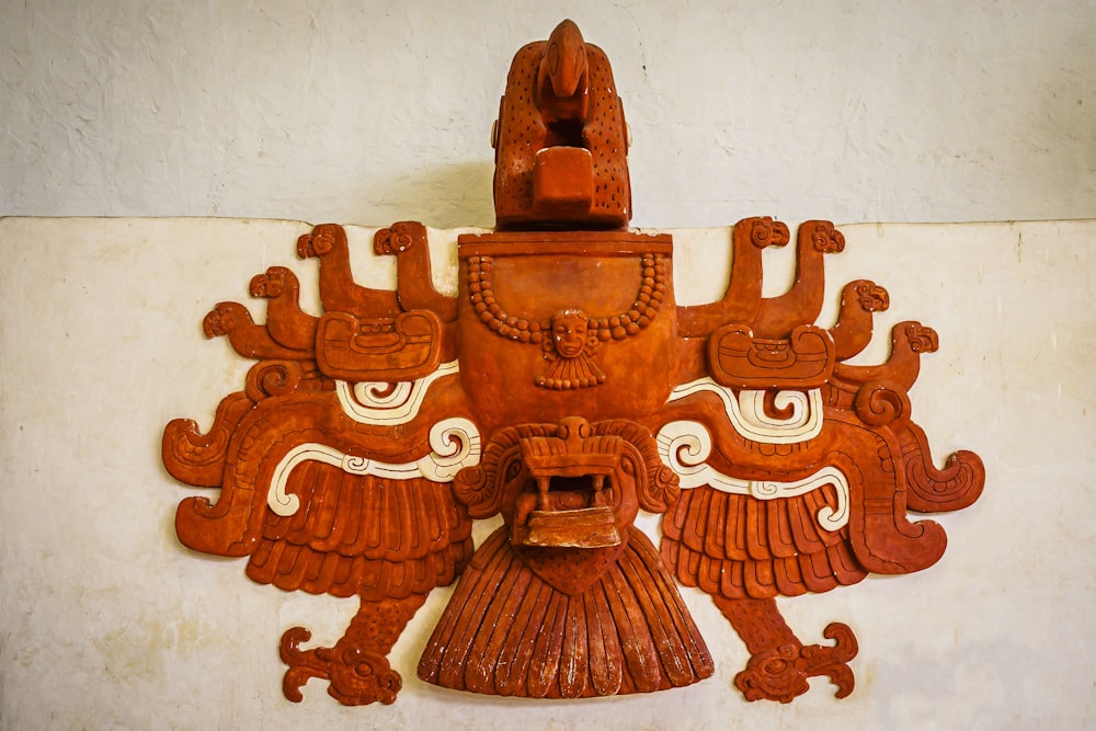 a group of carved wooden animals