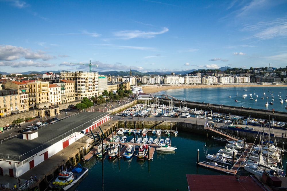 a body of water with boats in it and buildings around it