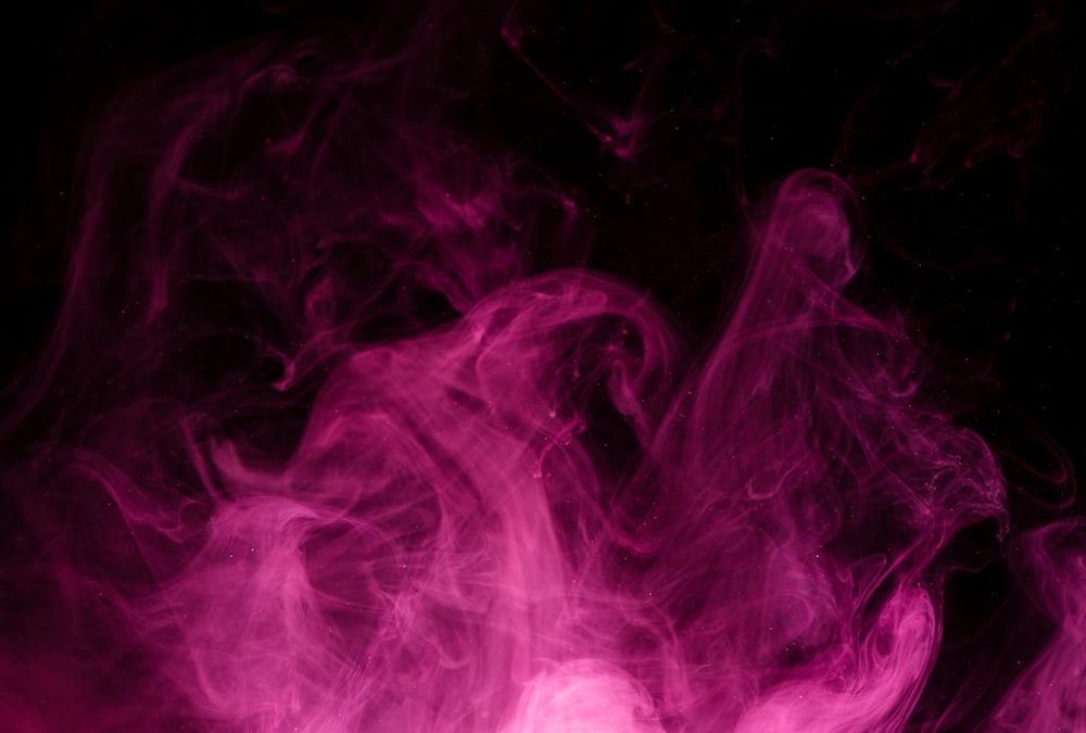 a pink and purple smoke