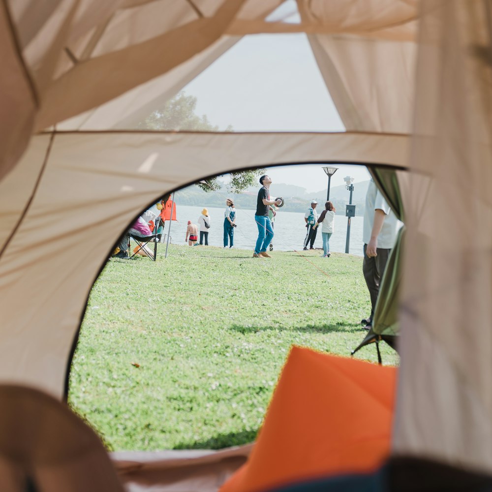 a mirror showing a group of people