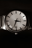 An elegant timepiece featuring a sleek stainless steel band.