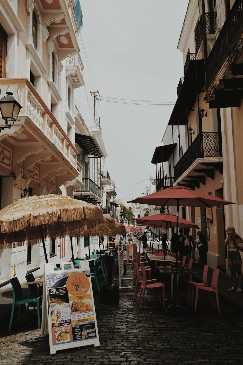 a street with tables and chairs