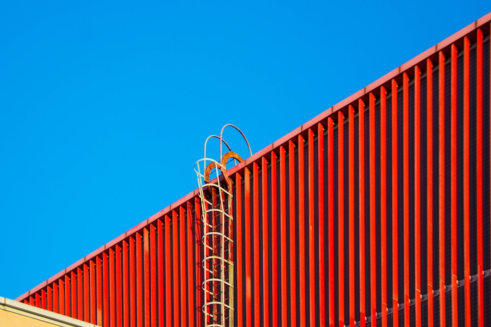 a red metal fence