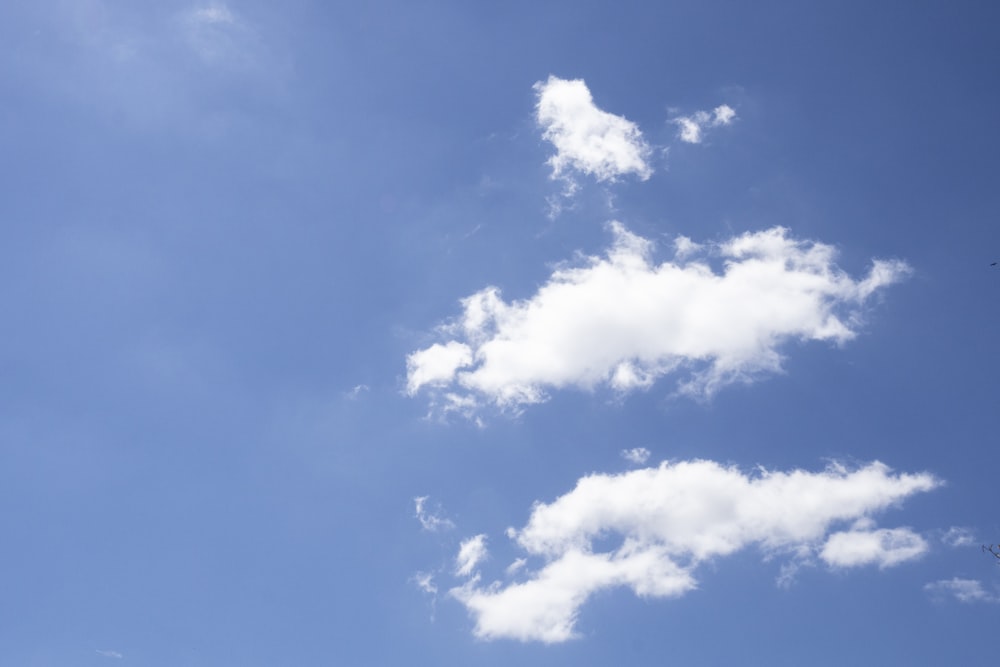 a blue sky with white clouds